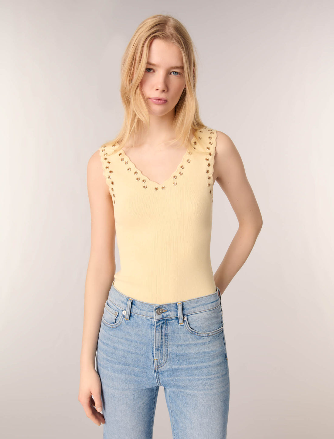 Top de punto y ojales