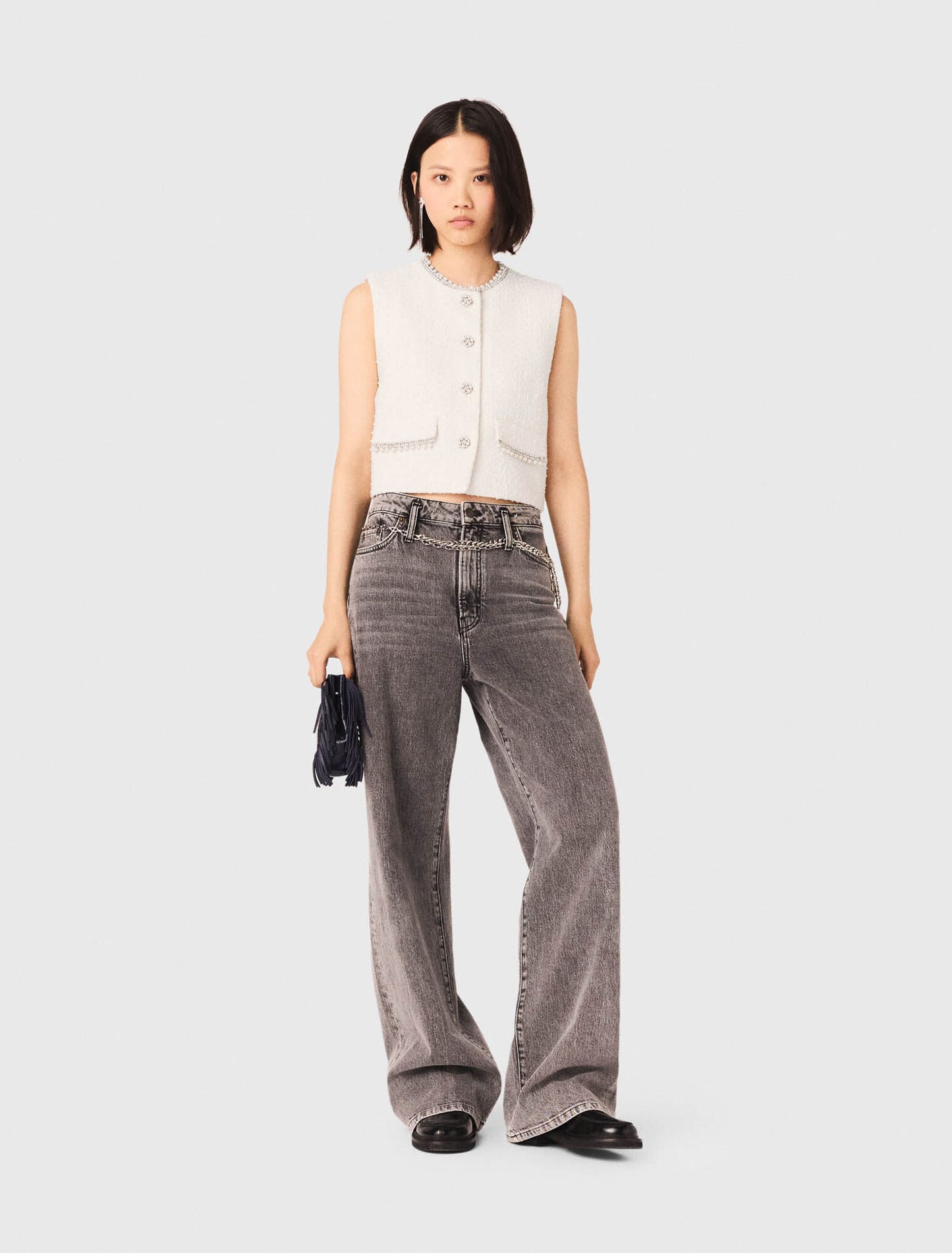 Chaleco de tweed y galón de perlas