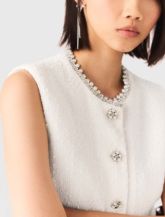 Chaleco de tweed y galón de perlas