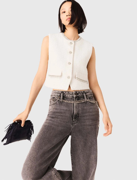 Chaleco de tweed y galón de perlas