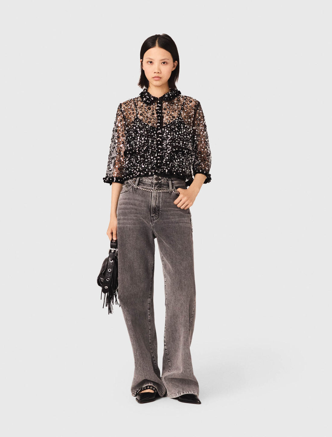 Polo con estampado floral y strass