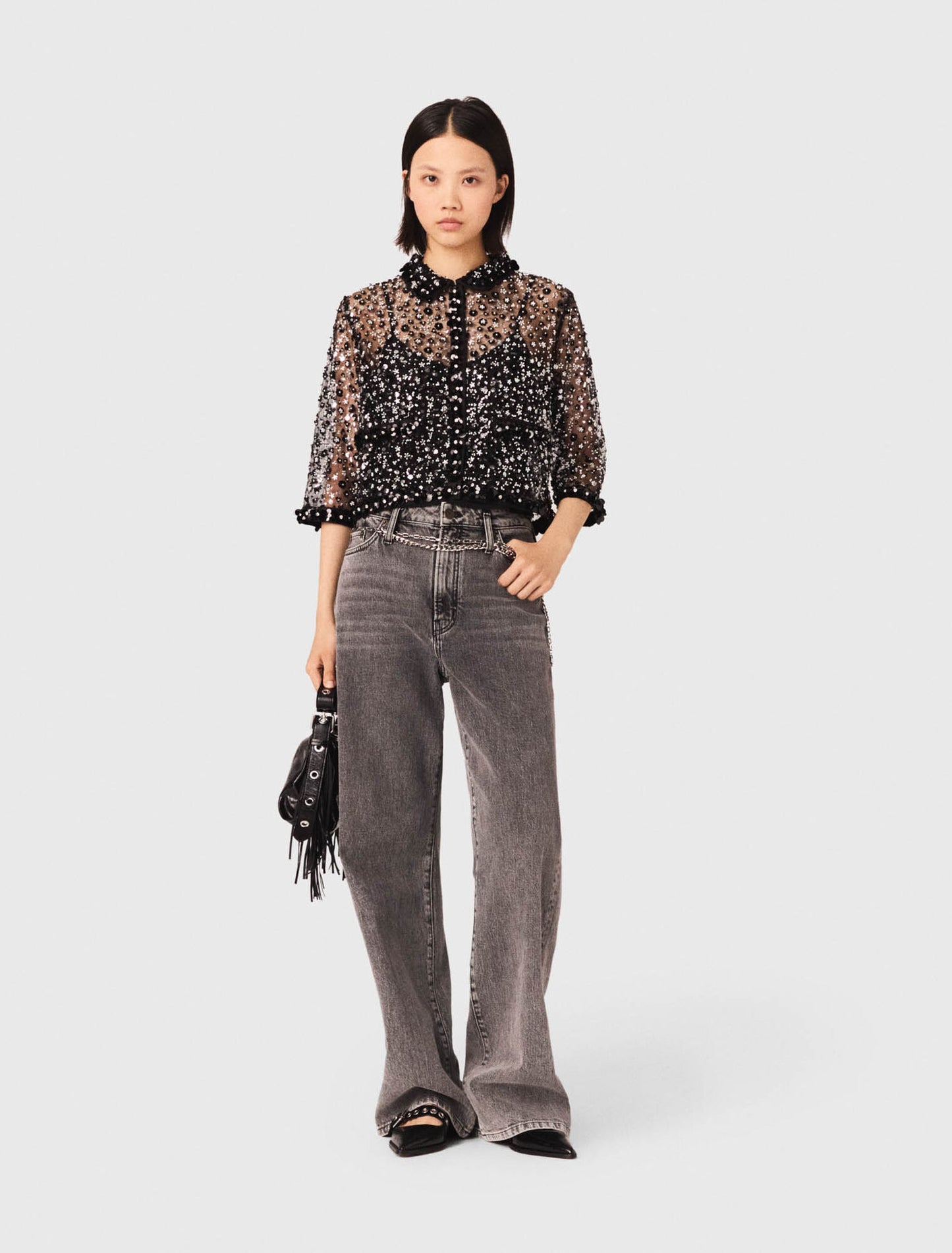 Polo con estampado floral y strass