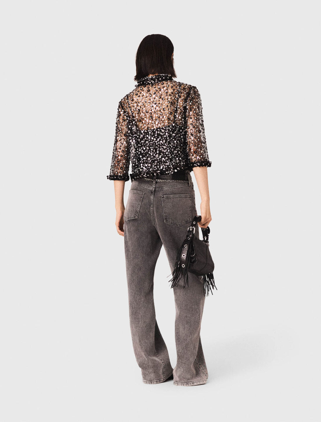 Polo con estampado floral y strass