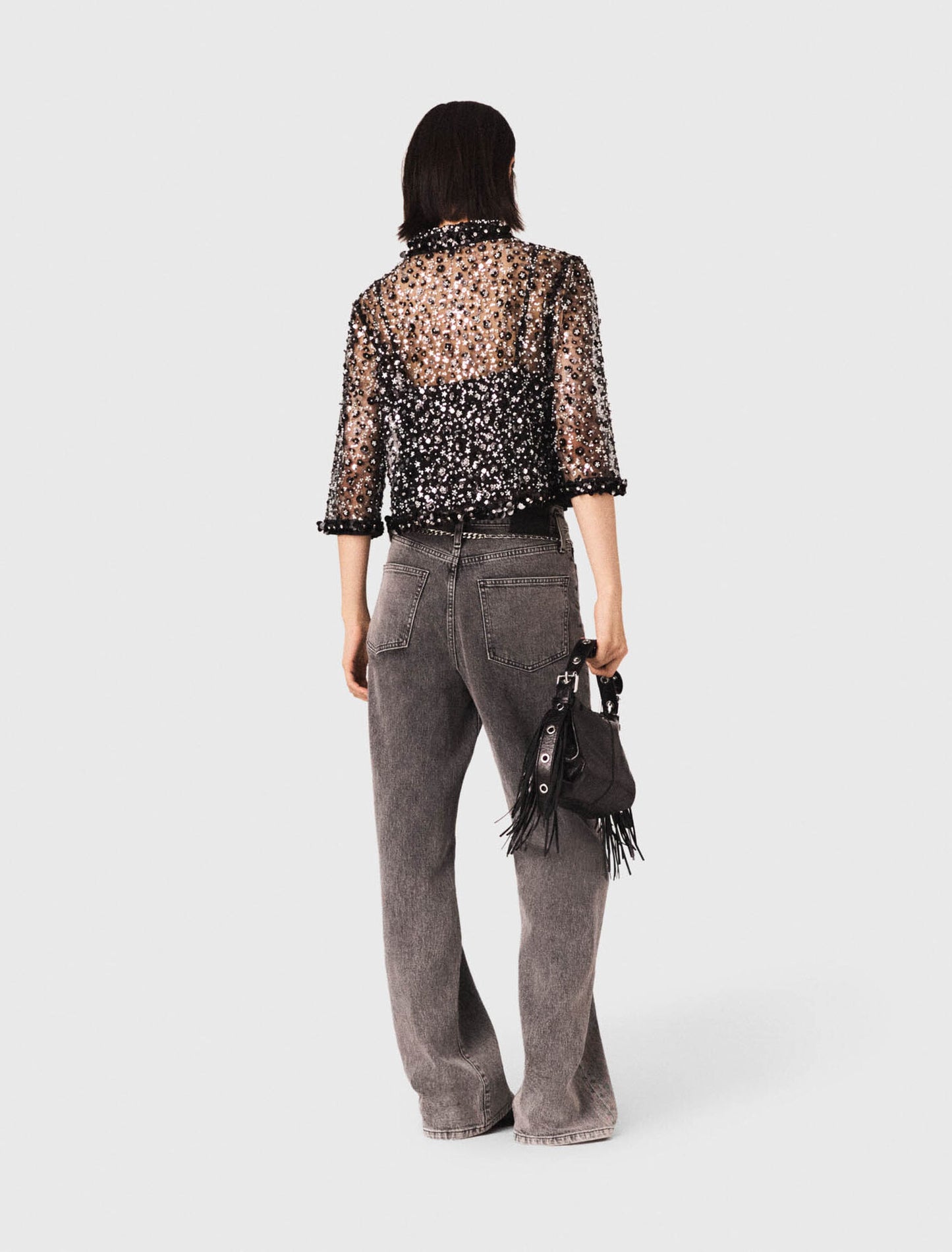 Polo con estampado floral y strass