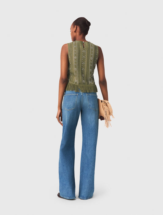 Top con flores de strass y flecos