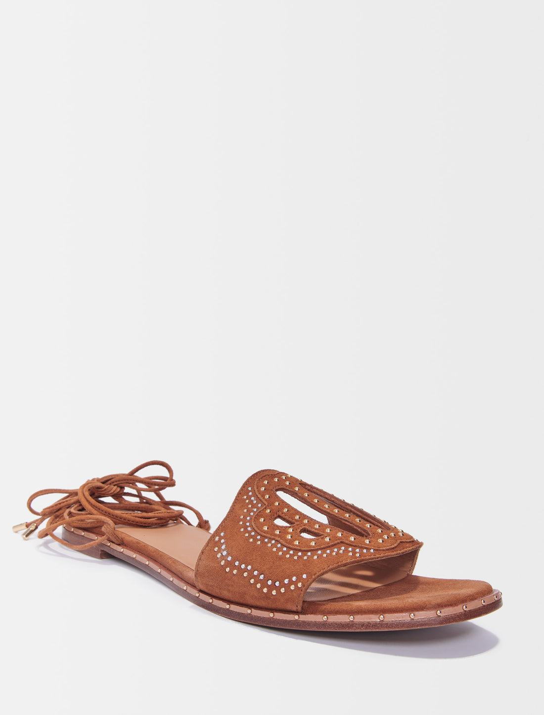 Sandalias planas para atar con tachuelas