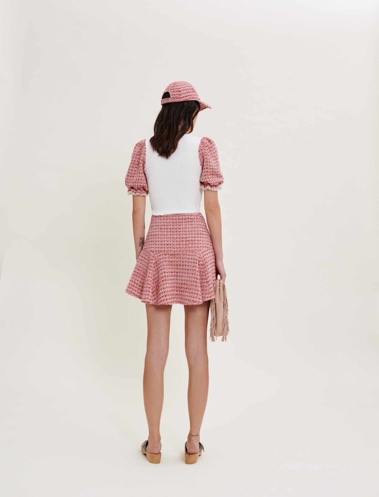 Jersey de punto y mangas de tweed