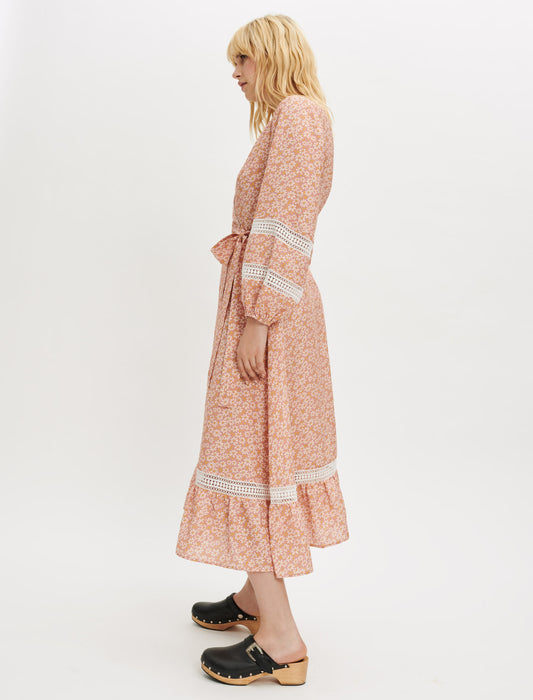 Vestido cruzado estampado con tiras