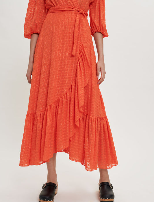 Vestido cruzado con volantes